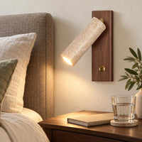 Applique murale bois et pierre finition noyer dans une chambre